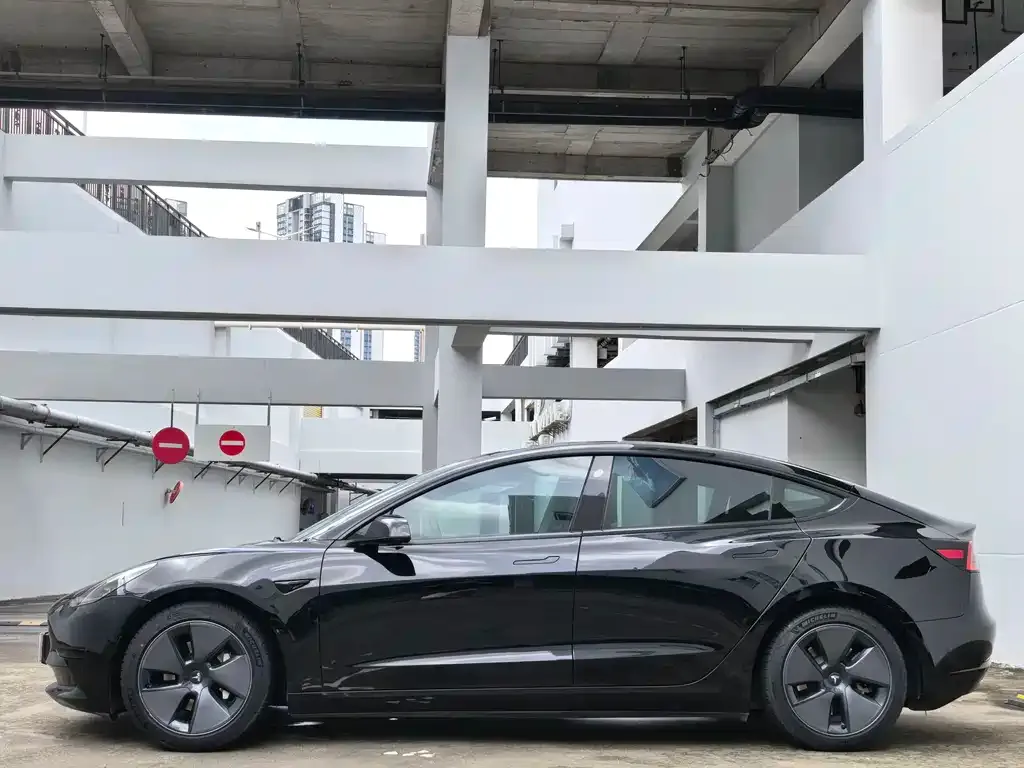 Tesla Model 3 — фото 7