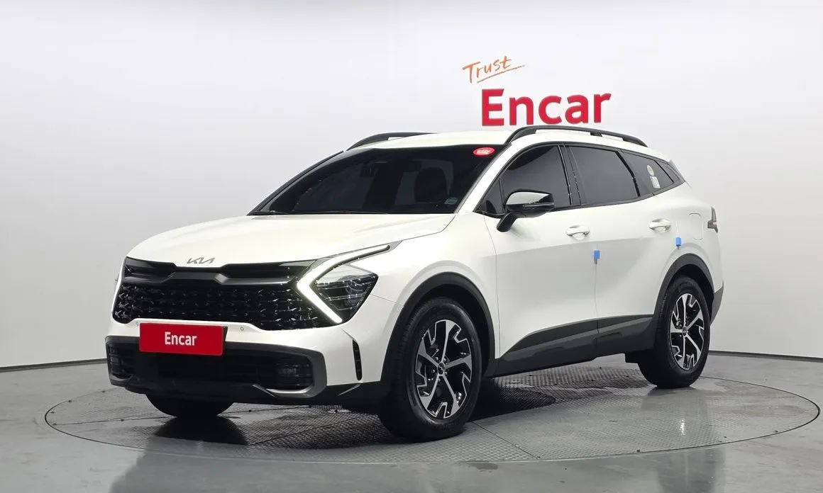 Kia Sportage — фото 1