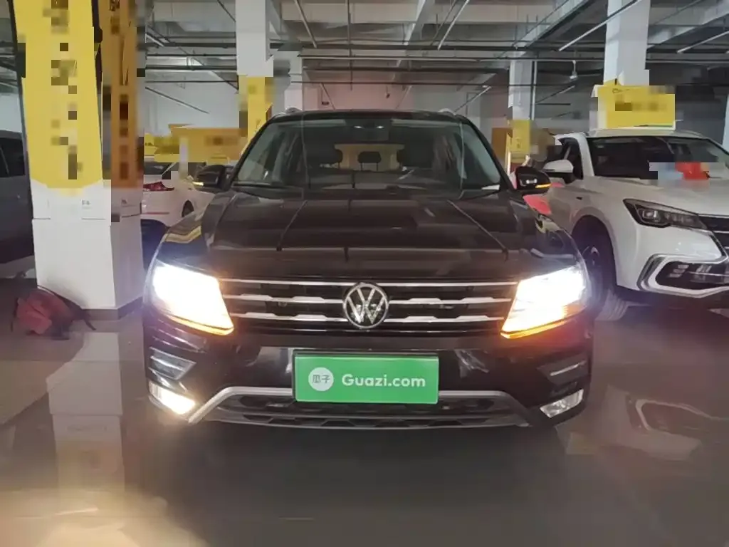 Volkswagen Tiguan L — фото 4