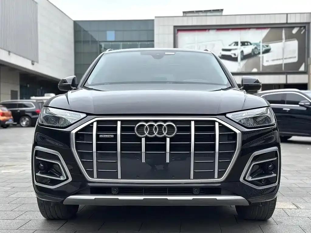 Audi Q5L — фото 8