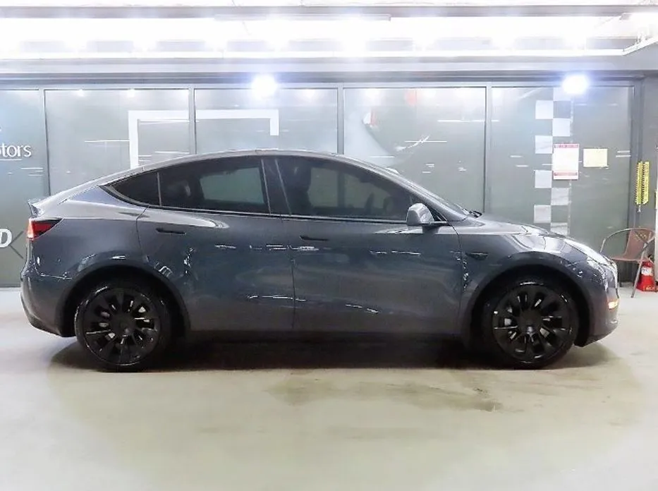 Tesla Model Y — фото 8