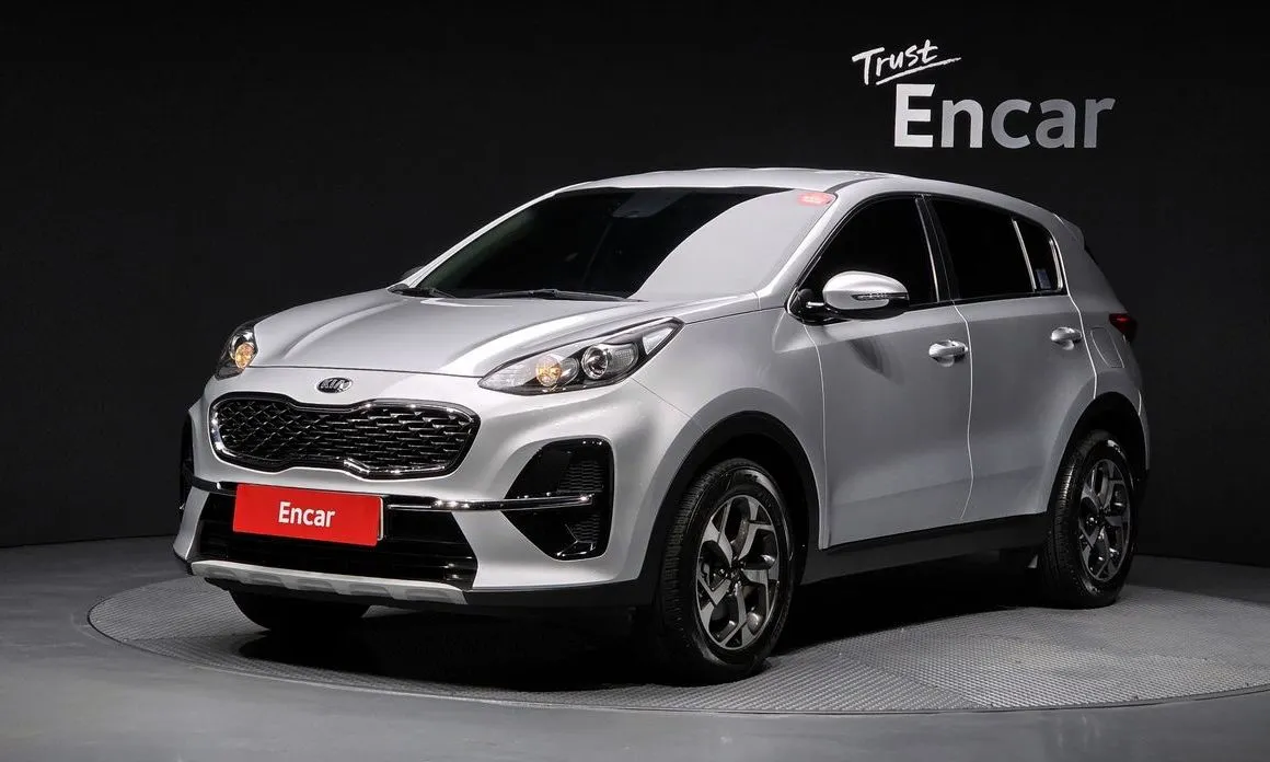 Kia Sportage — фото 1