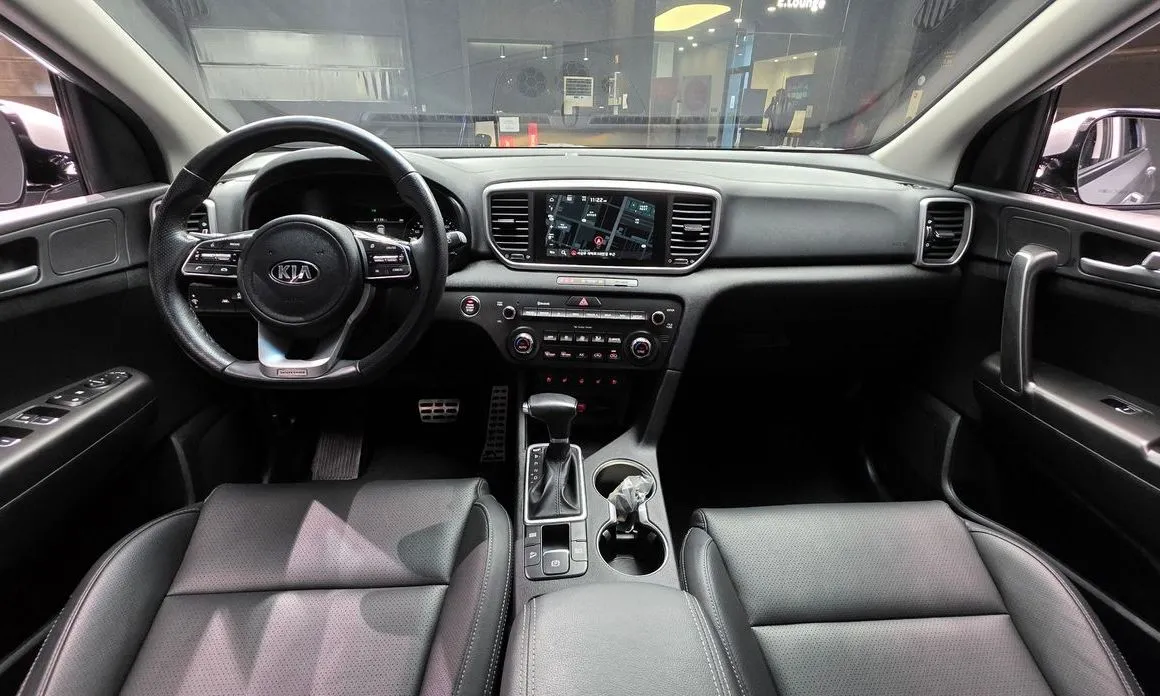 Kia Sportage — фото 10
