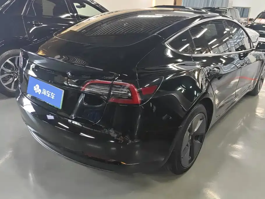 Tesla Model 3 — фото 10