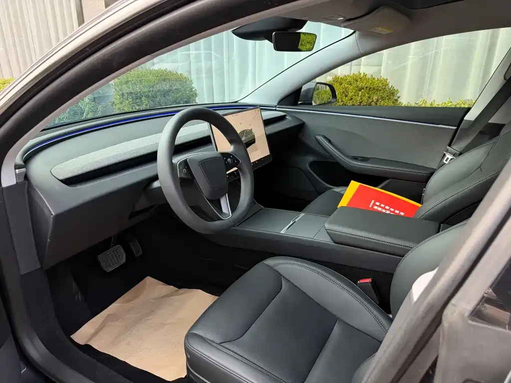 Tesla Model 3 — фото 9