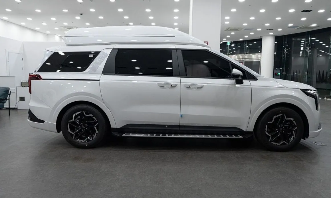 Kia Carnival — фото 10