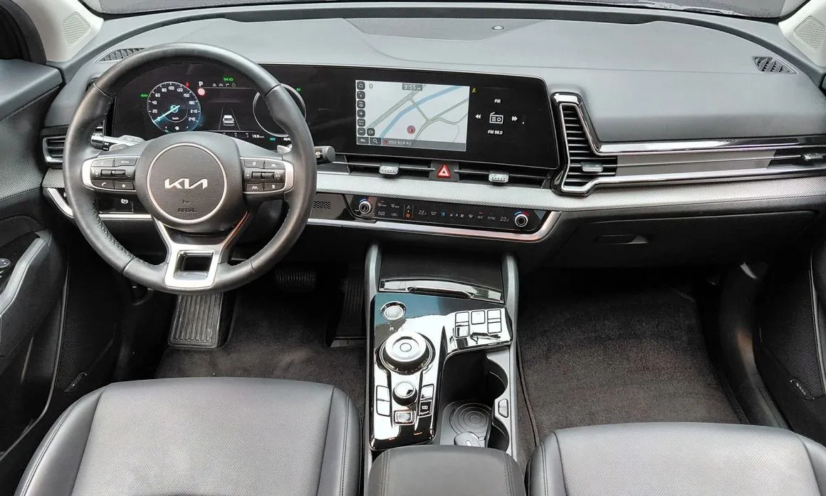 Kia Sportage — фото 9
