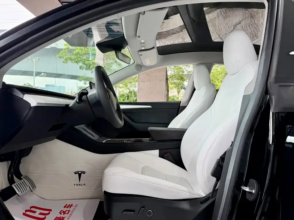 Tesla Model Y — фото 8