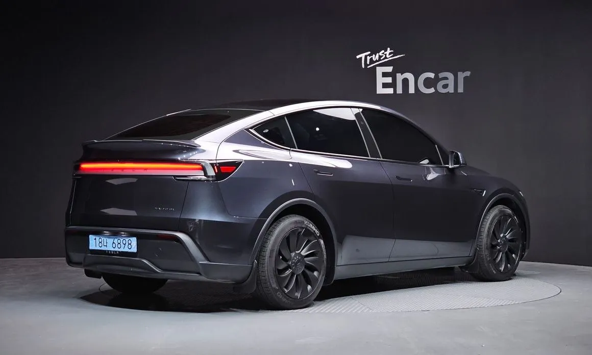 Tesla Model Y — фото 6