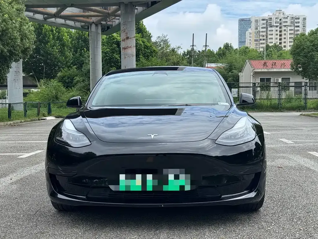 Tesla Model 3 — фото 10