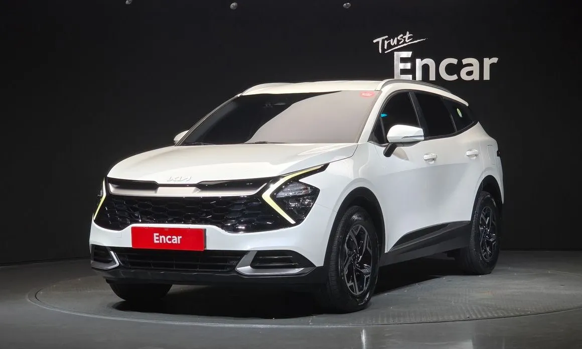 Kia Sportage — фото 1