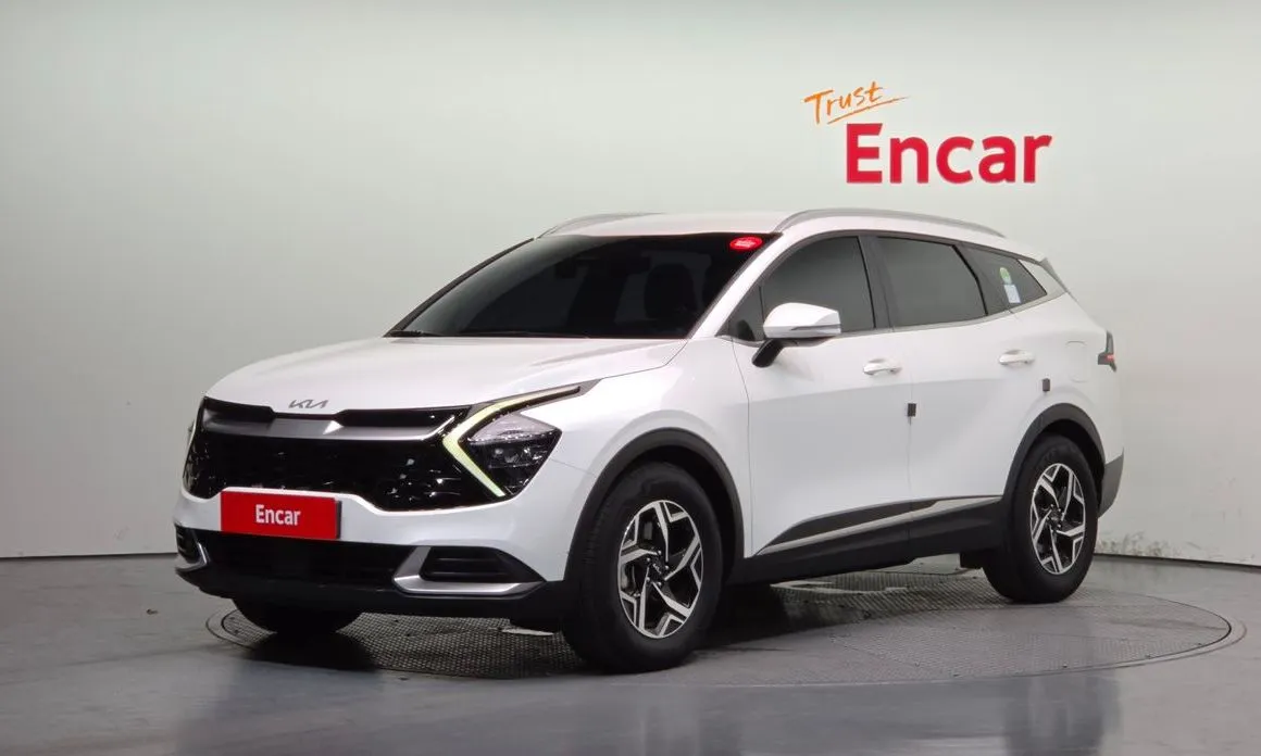 Kia Sportage — фото 1
