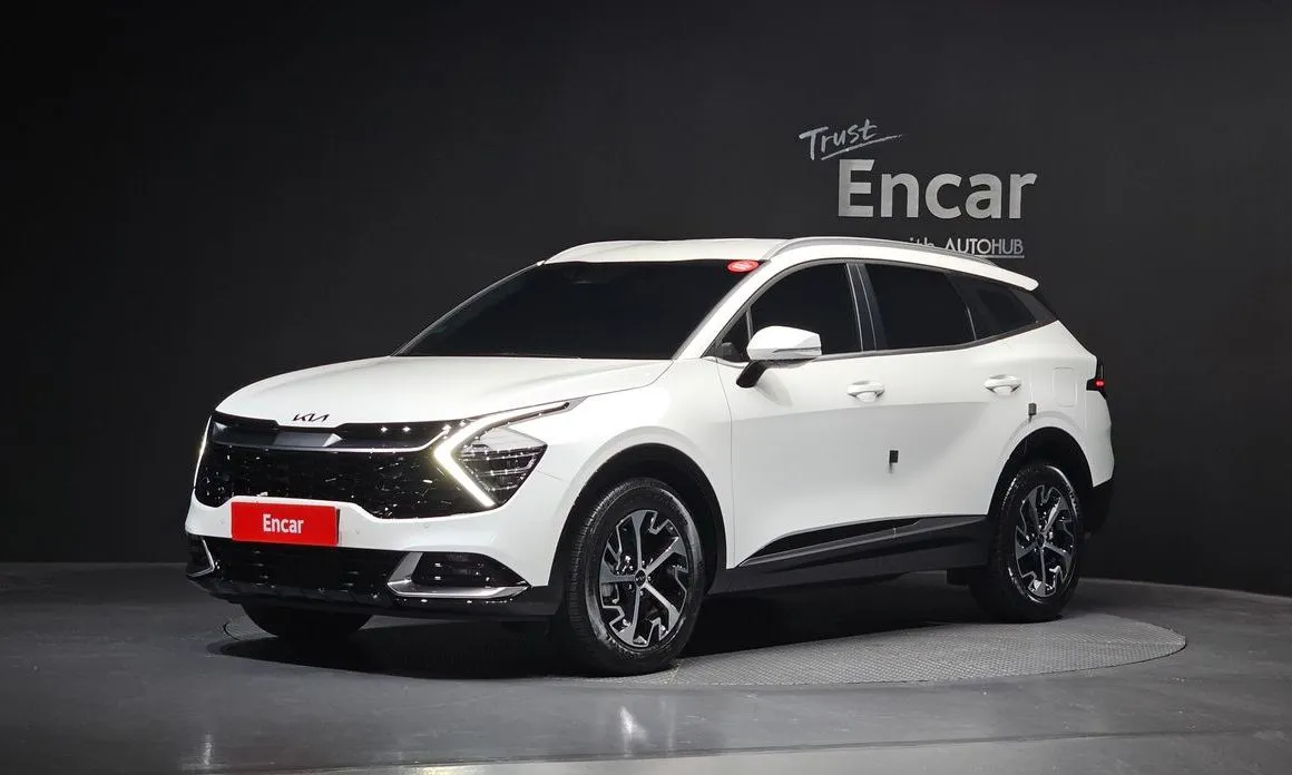 Kia Sportage — фото 1