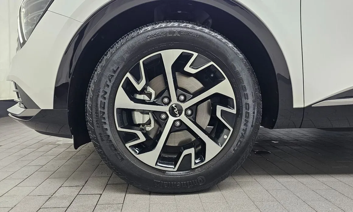 Kia Sportage — фото 10