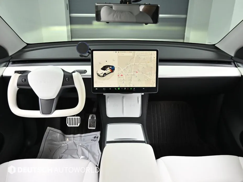 Tesla Model Y — фото 8