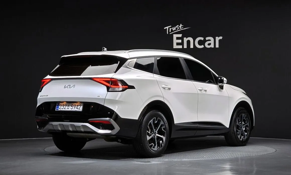 Kia Sportage — фото 7