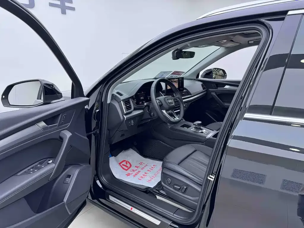 Audi Q5L — фото 8