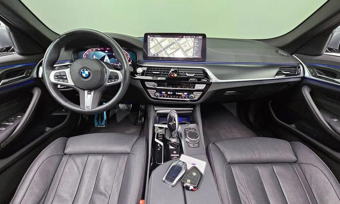 BMW 5-Series — фото 10