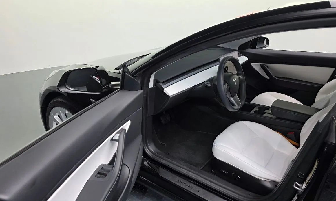 Tesla Model 3 — фото 10