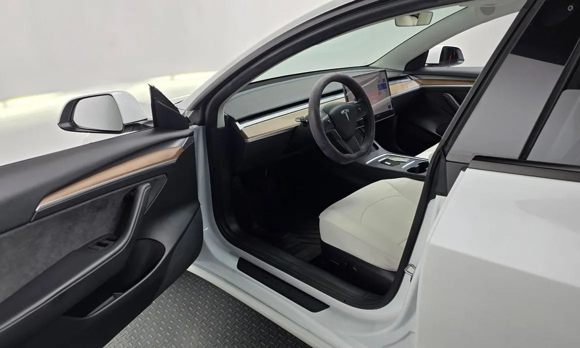 Tesla Model 3 — фото 8