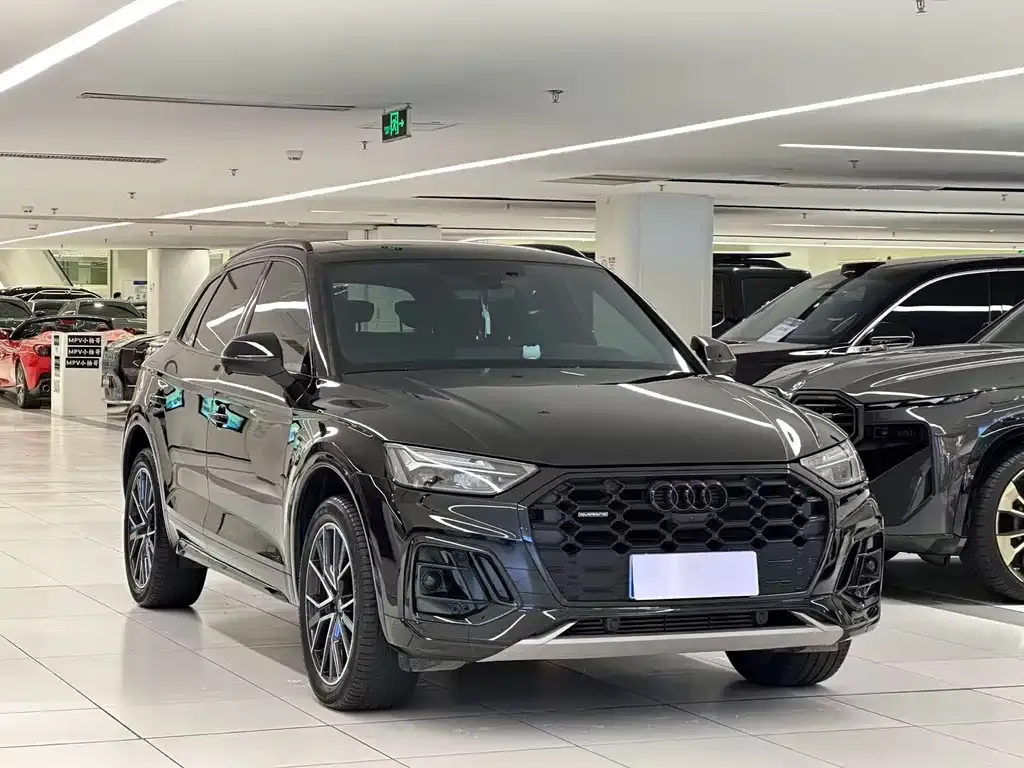 Audi Q5L — фото 5