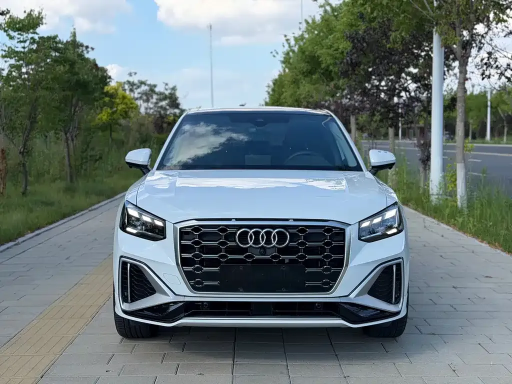 Audi Q2L — фото 4