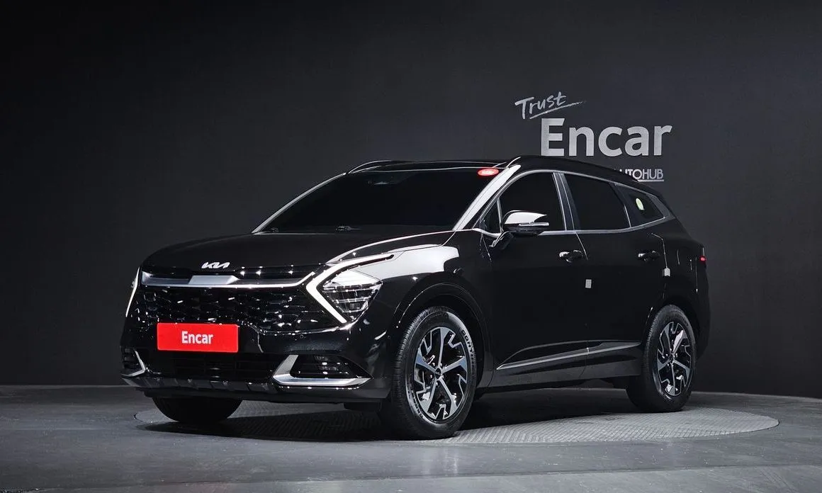 Kia Sportage — фото 1
