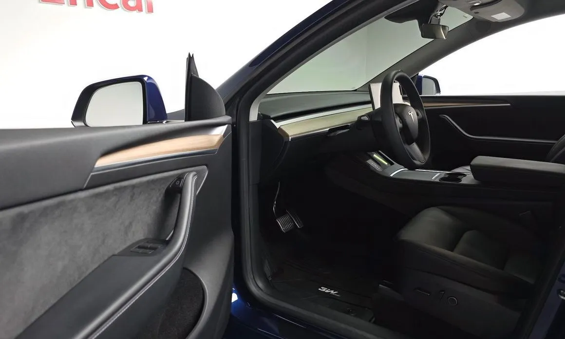 Tesla Model Y — фото 6