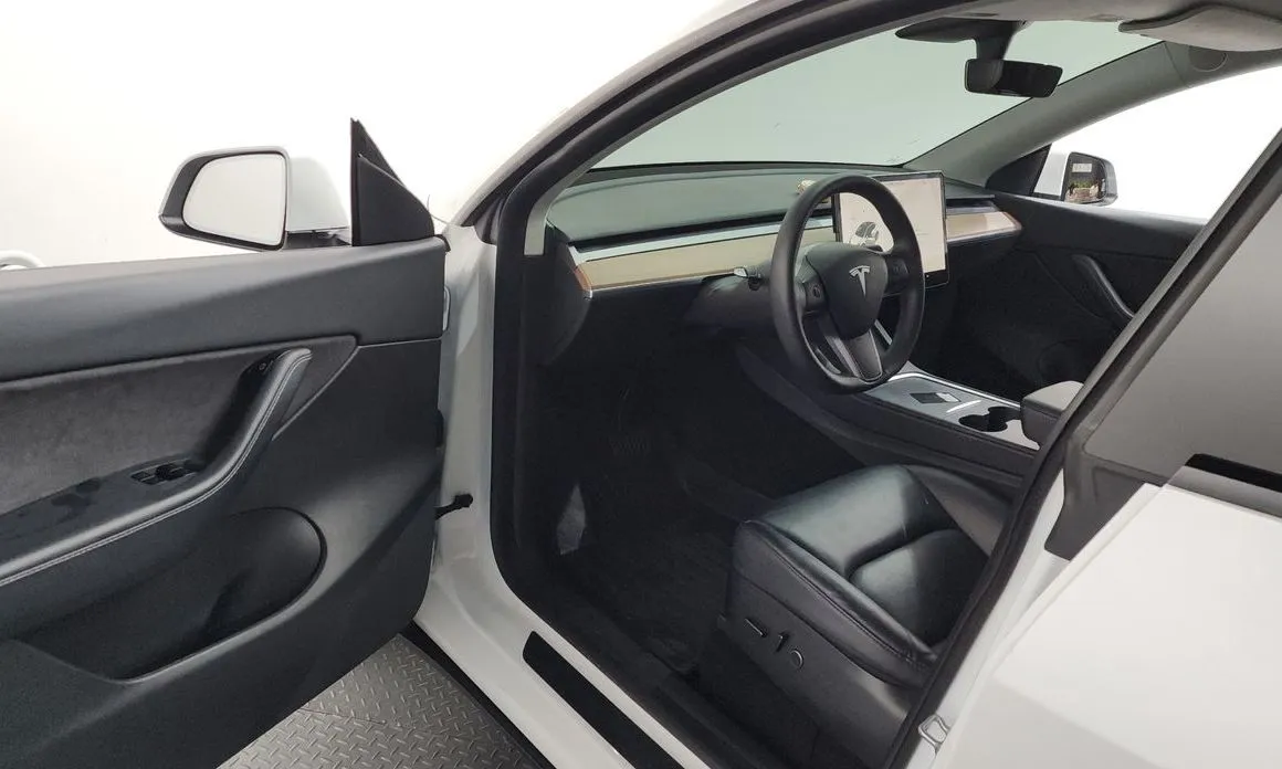 Tesla Model Y — фото 7