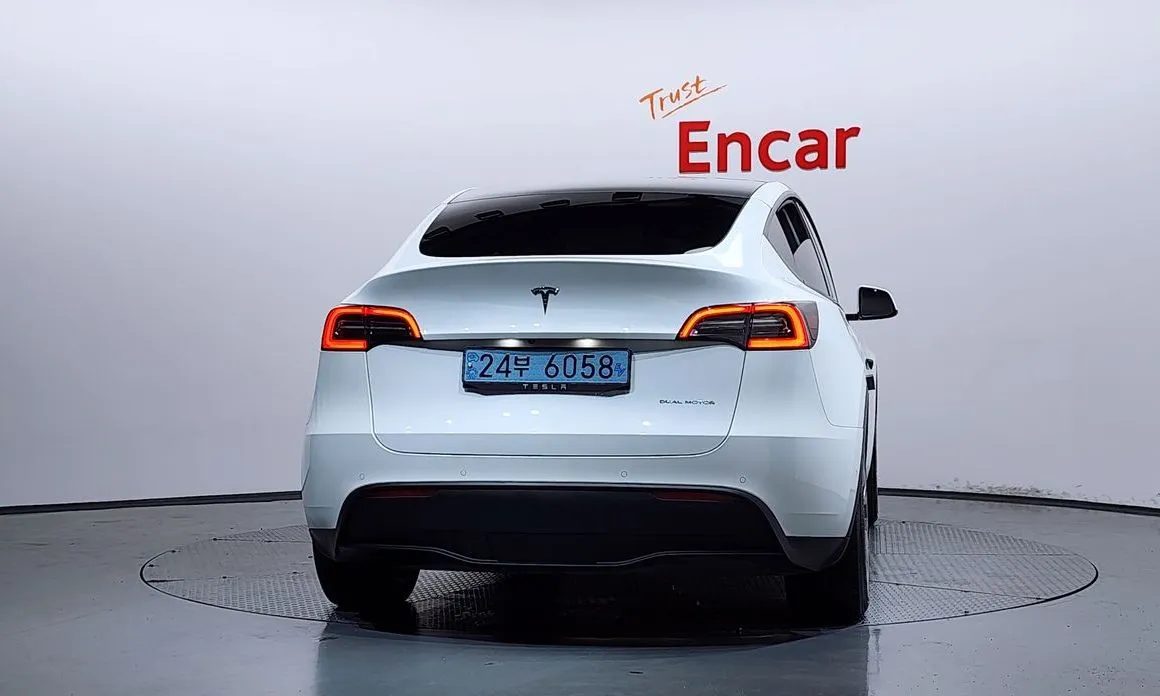 Tesla Model Y — фото 9