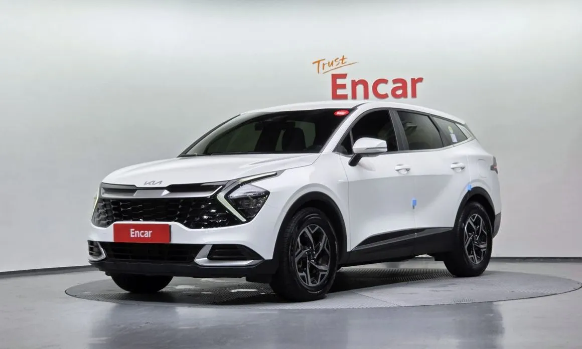 Kia Sportage — фото 1