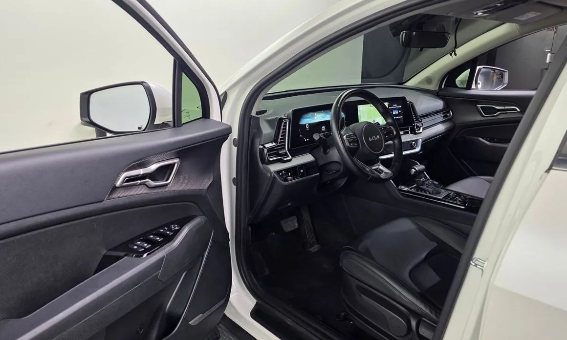 Kia Sportage — фото 9