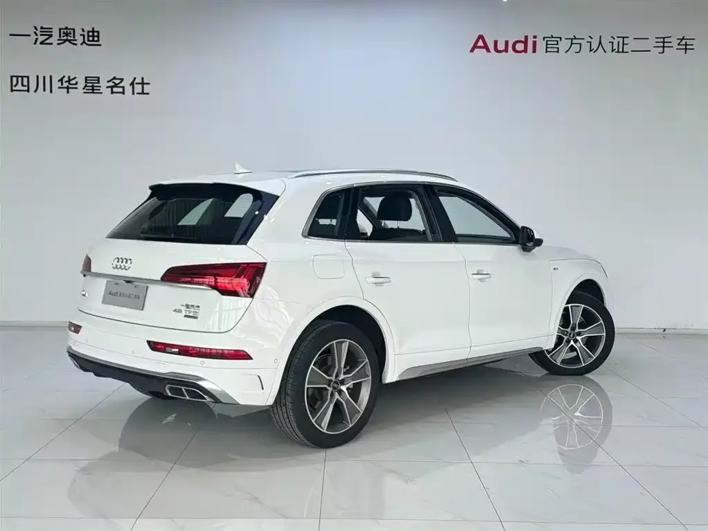 Audi Q5L — фото 5