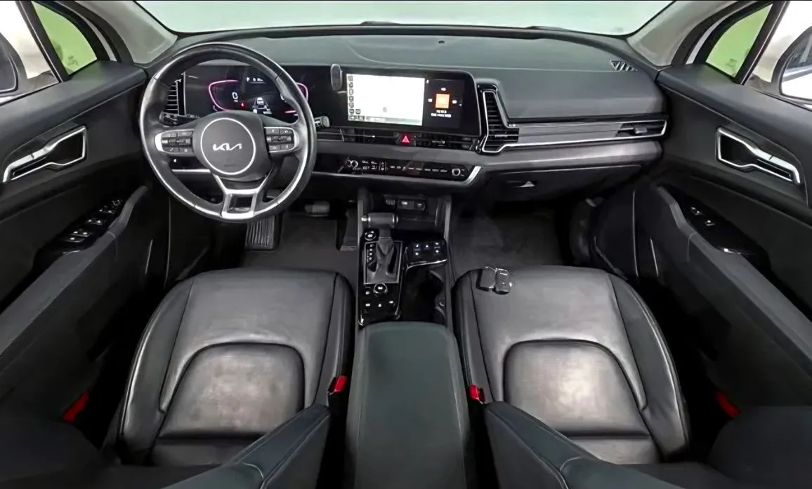 Kia Sportage — фото 9