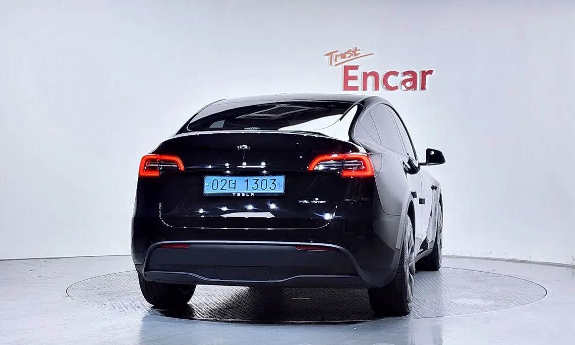 Tesla Model Y — фото 8