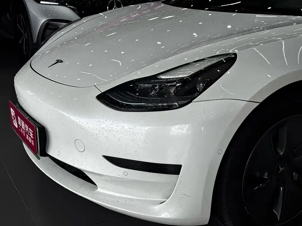 Tesla Model 3 — фото 9