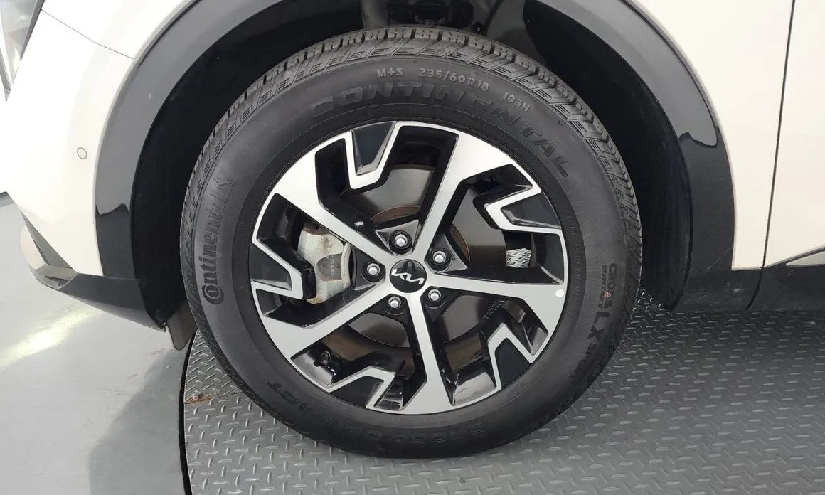Kia Sportage — фото 10