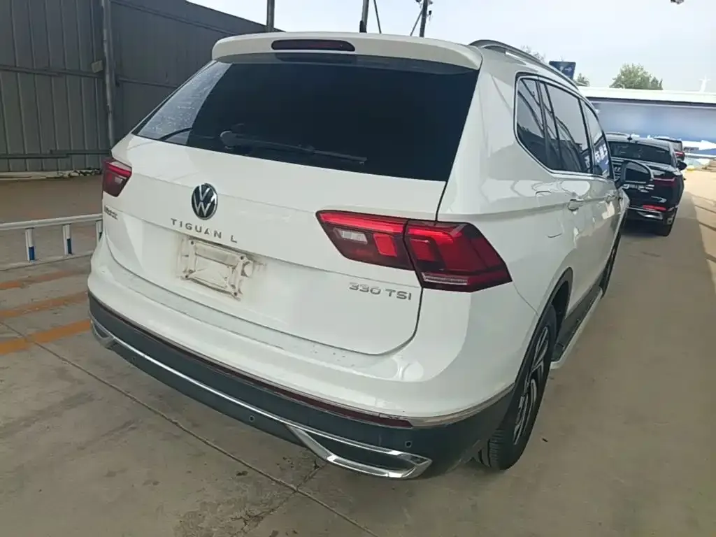 Volkswagen Tiguan L — фото 9