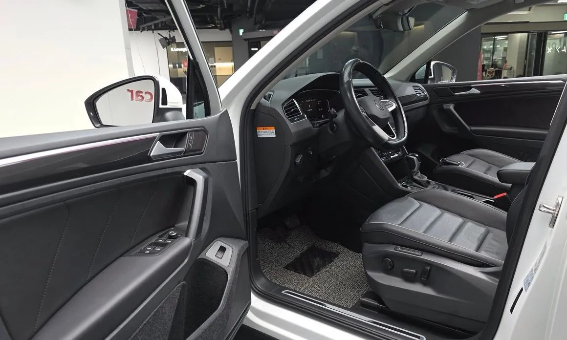 Volkswagen Tiguan — фото 8