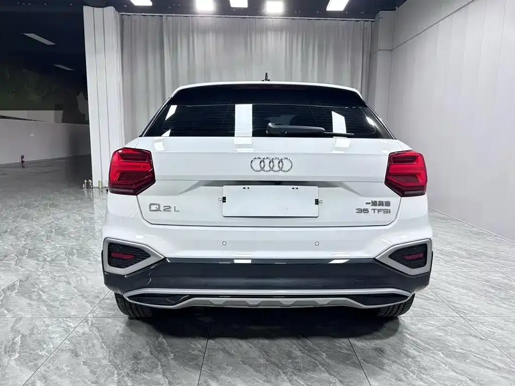 Audi Q2L — фото 5