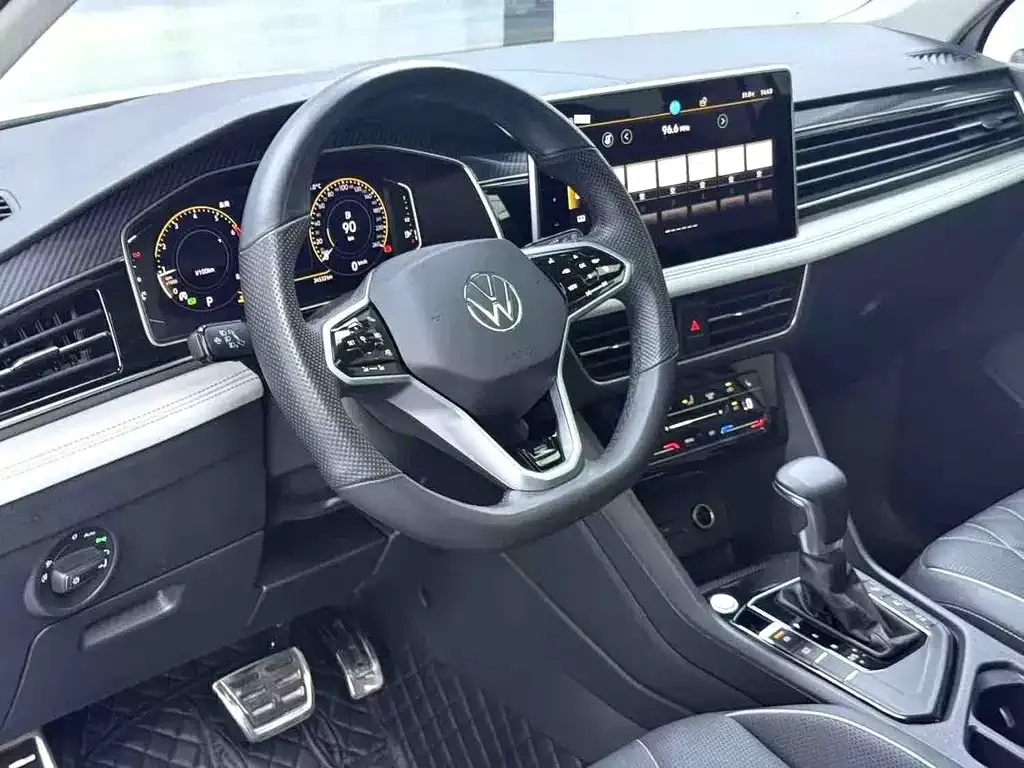 Volkswagen Tiguan L — фото 7