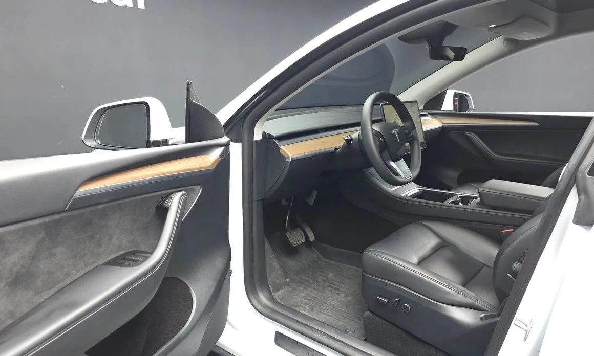 Tesla Model Y — фото 8