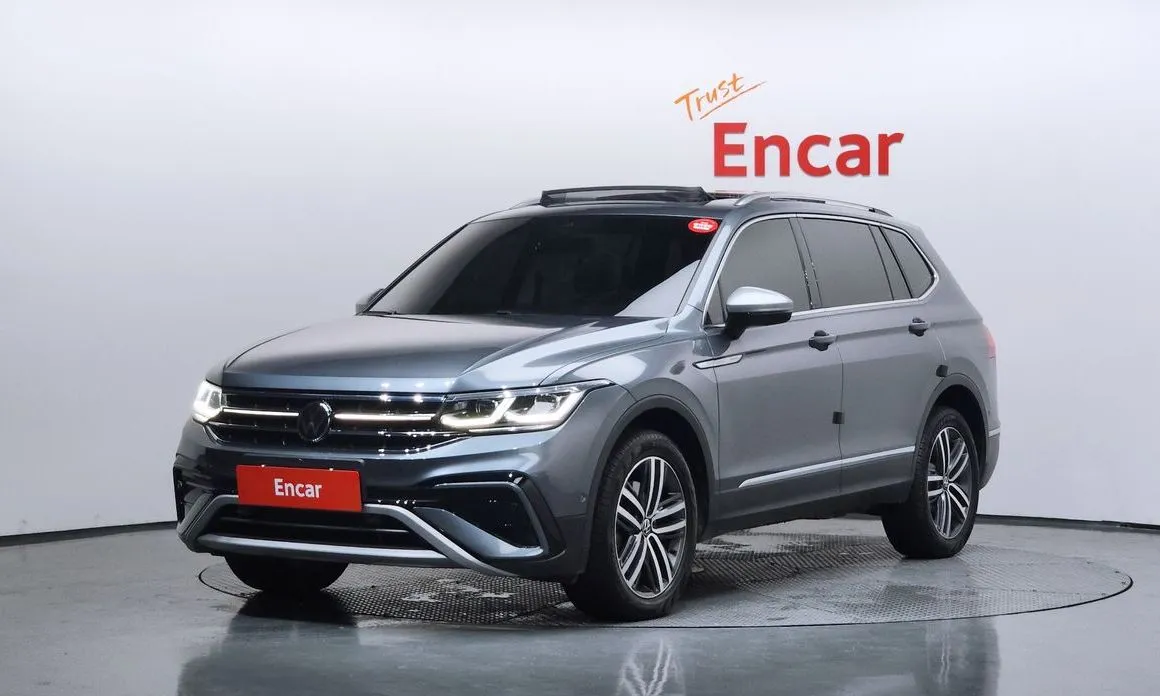 Volkswagen Tiguan — фото 1