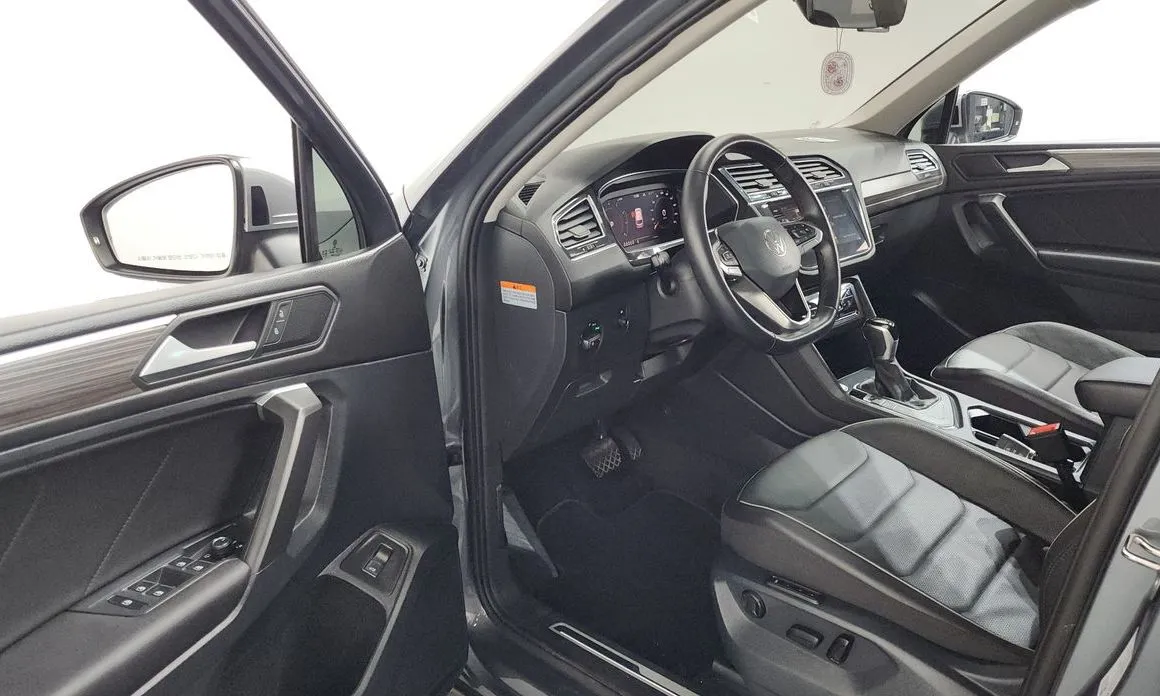 Volkswagen Tiguan — фото 8
