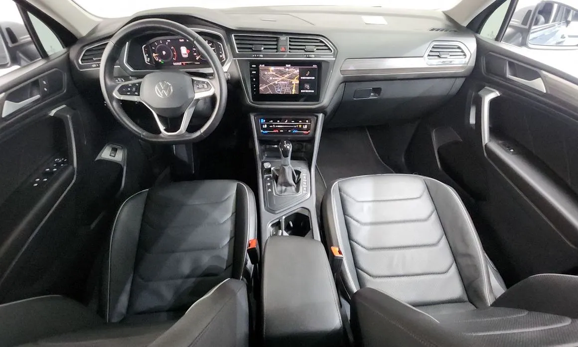 Volkswagen Tiguan — фото 7