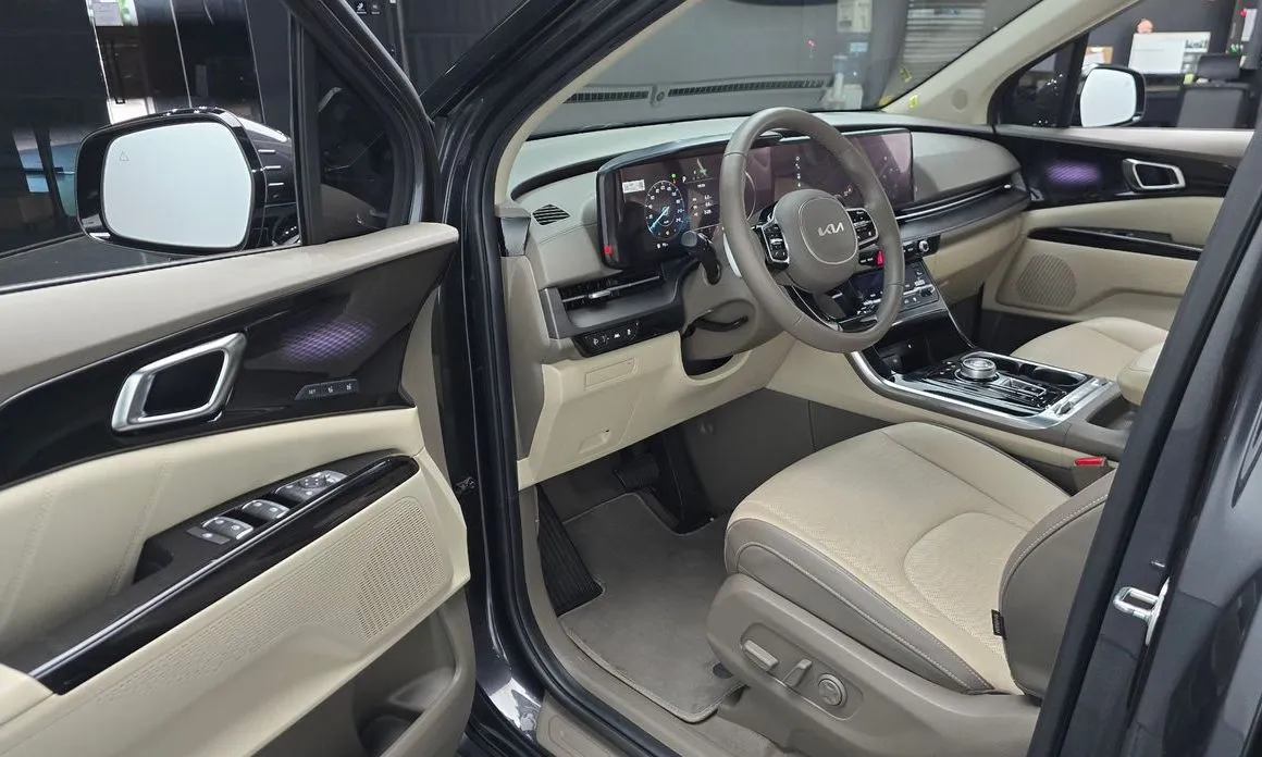 Kia Carnival — фото 10