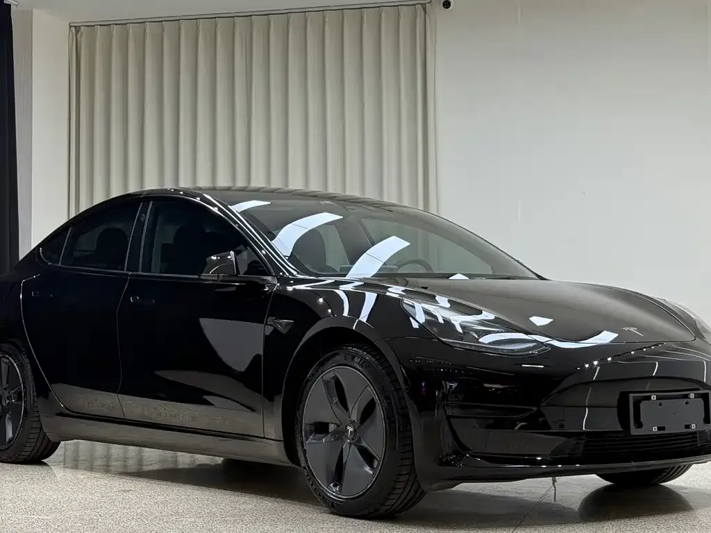 Tesla Model 3 — фото 7