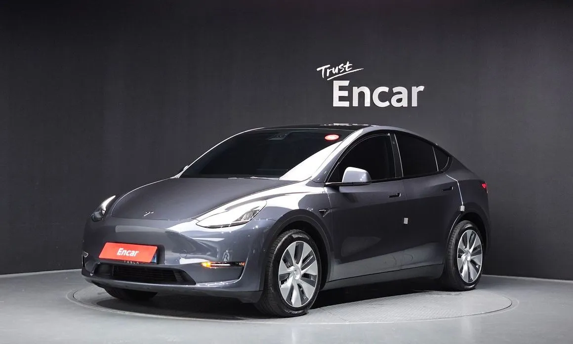 Tesla Model Y — фото 1