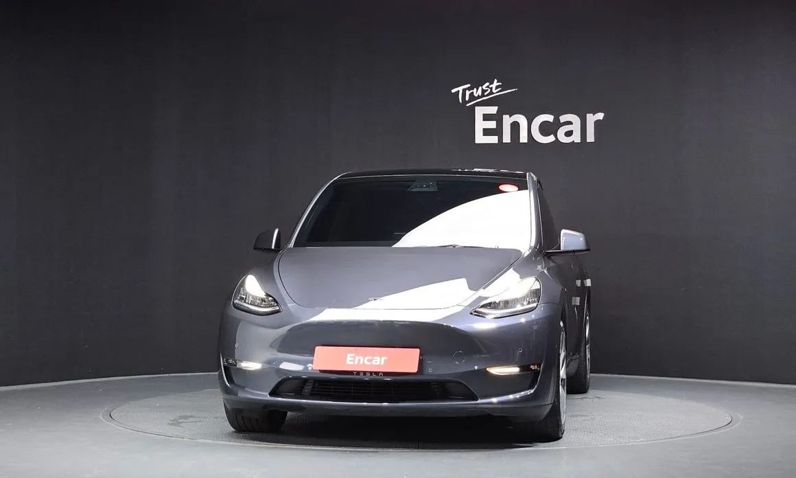 Tesla Model Y — фото 8