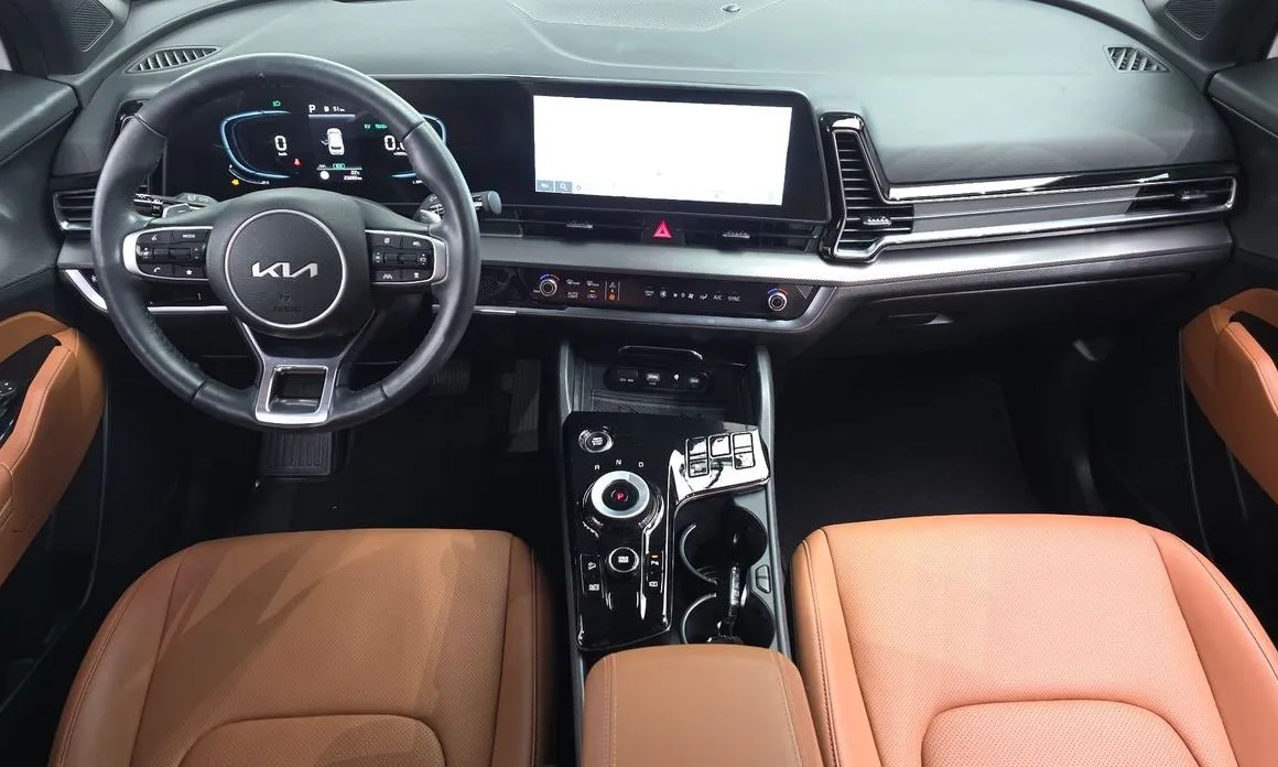 Kia Sportage — фото 10